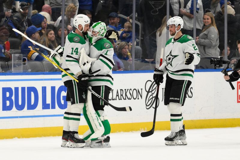 Jan 25, 2025; St. Louis, Missouri, USA; Dallas Stars goaltender Casey DeSmith (1) celebrates with left wing Jamie Benn (14) after shutting out the St. Louis Blues in a hockey game at Enterprise Center. Mandatory Credit: Jeff Le-Imagn Images