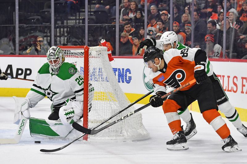 Jan 18, 2024; Philadelphia, Pennsylvania, USA;  Philadelphia Flyers right wing Cam Atkinson (89) takes a shot on goal against Dallas Stars defenseman Jani Hakanpaa (2) and goaltender Jake Oettinger (29) battle for position during the first period at Wells Fargo Center. Mandatory Credit: Eric Hartline-USA TODAY Sports