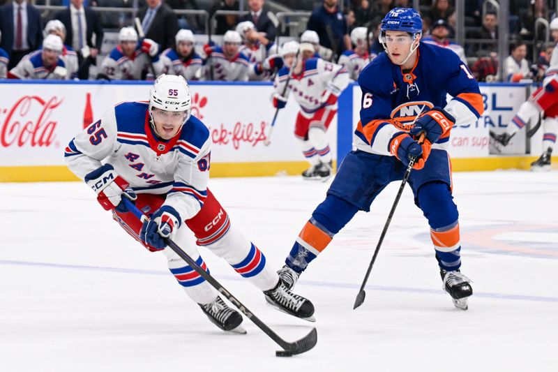 Apr 10, 2025; Elmont, New York, USA;  New York Islanders center Marc Gatcomb (16) defends against New York Rangers left wing Brett Berard (65) during the first period at UBS Arena. Mandatory Credit: Dennis Schneidler-Imagn Images