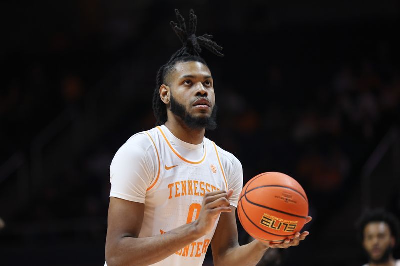 Dec 12, 2023; Knoxville, Tennessee, USA; Tennessee Volunteers forward Jonas Aidoo (0) shoots a free throw against the Georgia Southern Eagles at Food City Center at Thompson-Boling Arena. Mandatory Credit: Randy Sartin-USA TODAY Sports