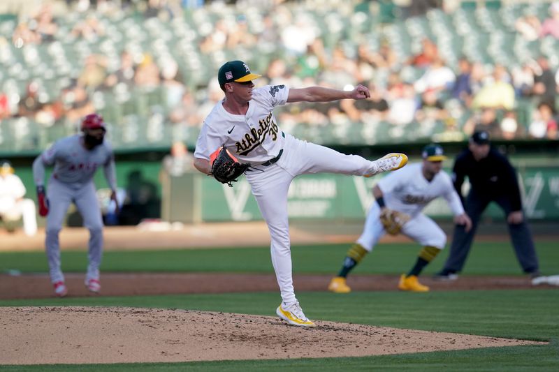 Jul 19, 2024; Oakland, California, USA; Oakland Athletics pitcher JP Sears (38) follows through on a pitch against the Los Angeles Angels in the second inning at Oakland-Alameda County Coliseum. Mandatory Credit: Cary Edmondson-USA TODAY Sports