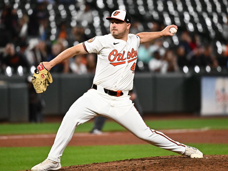Sep 9, 2025; Baltimore, Maryland, USA;  Baltimore Orioles pitcher Keegan Akin (45) delivers a pitch during the ninth inning against the Pittsburgh Pirates at Oriole Park at Camden Yards. Mandatory Credit: James A. Pittman-Imagn Images
