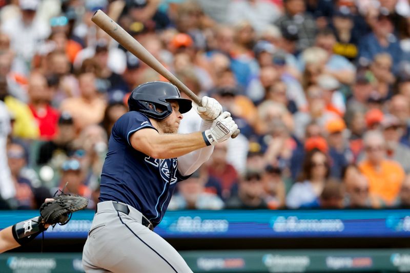 Sep 26, 2024; Detroit, Michigan, USA;  Tampa Bay Rays shortstop Taylor Walls (6) hits a single in the third inning against the Detroit Tigers at Comerica Park. Mandatory Credit: Rick Osentoski-Imagn Images