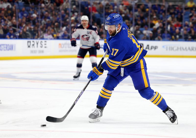 Oct 28, 2025; Buffalo, New York, USA;  Buffalo Sabres left wing Jason Zucker (17) takes a shot on goal during the second period against the Columbus Blue Jackets at KeyBank Center. Mandatory Credit: Timothy T. Ludwig-Imagn Images
