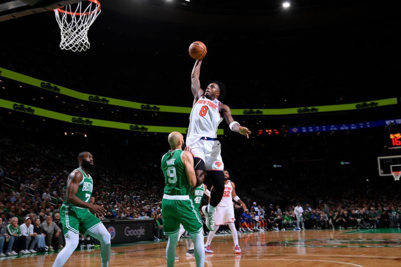 BOSTON, MA - MAY 7: OG Anunoby #8 of the New York Knicks drives to the basket during the game against the Boston Celtics during Round 2 Game 2 on May 7, 2025 at TD Garden in Boston, Massachusetts. NOTE TO USER: User expressly acknowledges and agrees that, by downloading and/or using this Photograph, user is consenting to the terms and conditions of the Getty Images License Agreement. Mandatory Copyright Notice: Copyright 2025 NBAE (Photo by Brian Babineau/NBAE via Getty Images)