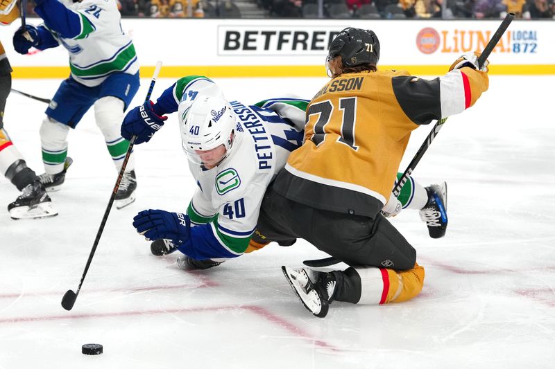 Mar 7, 2024; Las Vegas, Nevada, USA; Vancouver Canucks center Elias Pettersson (40) takes a face off against Vegas Golden Knights center William Karlsson (71) during the first period at T-Mobile Arena. Mandatory Credit: Stephen R. Sylvanie-USA TODAY Sports