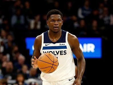 MINNEAPOLIS, MINNESOTA - NOVEMBER 01: Anthony Edwards #5 of the Minnesota Timberwolves dribbles the ball against the Denver Nuggets in the first quarter at Target Center on November 01, 2023 in Minneapolis, Minnesota. The Timberwolves defeated the Nuggets 110-89. NOTE TO USER: User expressly acknowledges and agrees that, by downloading and or using this photograph, User is consenting to the terms and conditions of the Getty Images License Agreement. (Photo by David Berding/Getty Images)