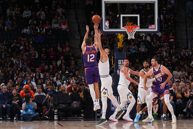 DENVER, CO - OCTOBER 13: Collin Gillespie #12 of the Phoenix Suns shoots a three point basket during the game against the Denver Nuggets on October 13, 2024 at Ball Arena in Denver, Colorado. NOTE TO USER: User expressly acknowledges and agrees that, by downloading and/or using this Photograph, user is consenting to the terms and conditions of the Getty Images License Agreement. Mandatory Copyright Notice: Copyright 2024 NBAE (Photo by Bart Young/NBAE via Getty Images)