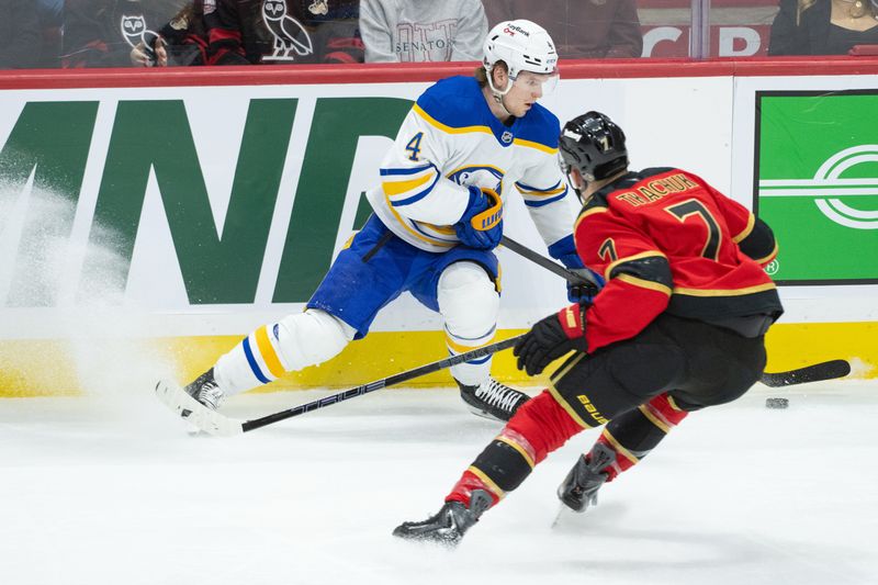 Dec 23, 2025; Ottawa, Ontario, CAN; Buffalo Sabres defenseman Bowen Byram (4) controls the puck as Ottawa Senators left wing Brady Tkachuk (7) moves in during the third period at the Canadian Tire Centre. Mandatory Credit: Marc DesRosiers-IMAGN Images