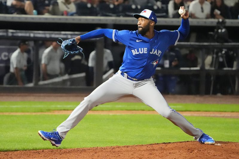 Feb 28, 2025; Tampa, Florida, USA; Toronto Blue Jays pitcher Amir Garrett (90) throws a pitch against the New York Yankees during the sixth inning at George M. Steinbrenner Field. Mandatory Credit: Dave Nelson-Imagn Images