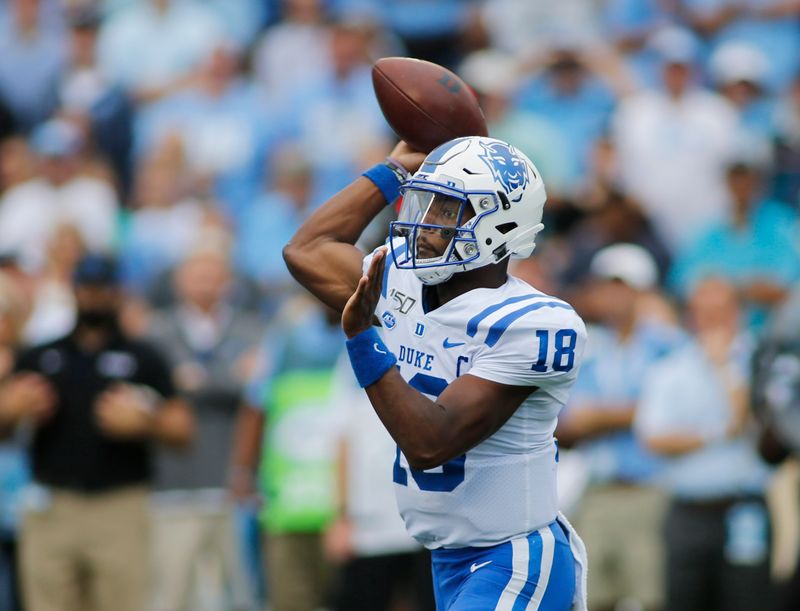 Oct 26, 2019; Chapel Hill, NC, USA; Duke Blue Devils quarterback Quentin Harris (18) passes against the North Carolina Tar Heels in the first half at Kenan Memorial Stadium. Mandatory Credit: Nell Redmond-USA TODAY Sports