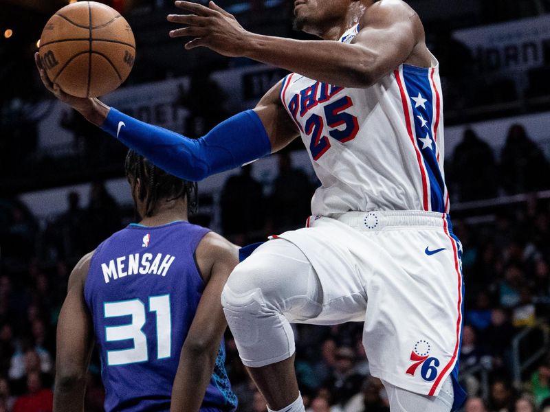 CHARLOTTE, NORTH CAROLINA - JANUARY 20: Danuel House Jr. #25 of the Philadelphia 76ers drives to the basket against the Charlotte Hornets during their game at Spectrum Center on January 20, 2024 in Charlotte, North Carolina. NOTE TO USER: User expressly acknowledges and agrees that, by downloading and or using this photograph, User is consenting to the terms and conditions of the Getty Images License Agreement. (Photo by Jacob Kupferman/Getty Images)