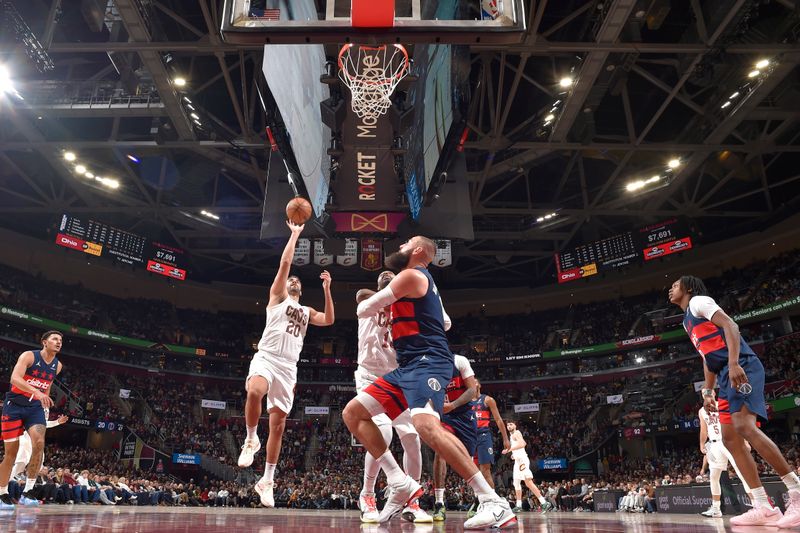 CLEVELAND, OH - DECEMBER 13: Georges Niang #20 of the Cleveland Cavaliers drives to the basket during the game against the Washington Wizards on December 13, 2024 at Rocket Mortgage FieldHouse in Cleveland, Ohio. NOTE TO USER: User expressly acknowledges and agrees that, by downloading and/or using this Photograph, user is consenting to the terms and conditions of the Getty Images License Agreement. Mandatory Copyright Notice: Copyright 2024 NBAE (Photo by David Liam Kyle/NBAE via Getty Images)