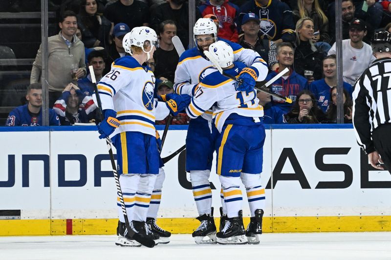 Nov 7, 2024; New York, New York, USA;  Buffalo Sabres left wing Jordan Greenway (12) celebrates his goal against the New York Rangers during the second period at Madison Square Garden. Mandatory Credit: Dennis Schneidler-Imagn Images