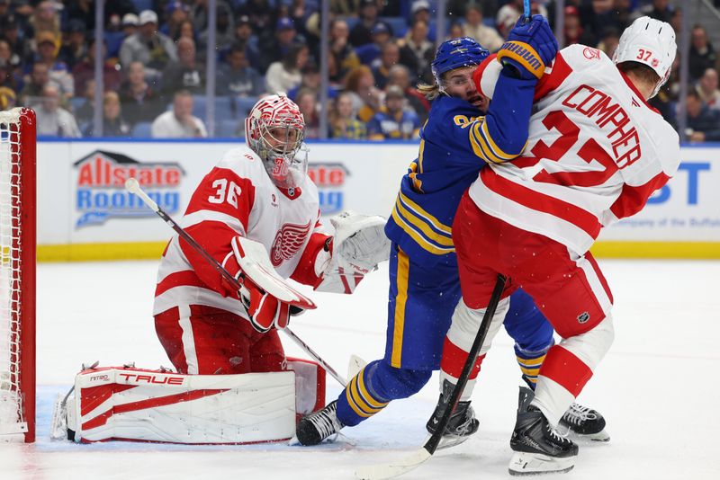 Oct 22, 2025; Buffalo, New York, USA;  Detroit Red Wings goaltender John Gibson (36) and Buffalo Sabres right wing Josh Doan (91) look for the puck during the second period at KeyBank Center. Mandatory Credit: Timothy T. Ludwig-Imagn Images