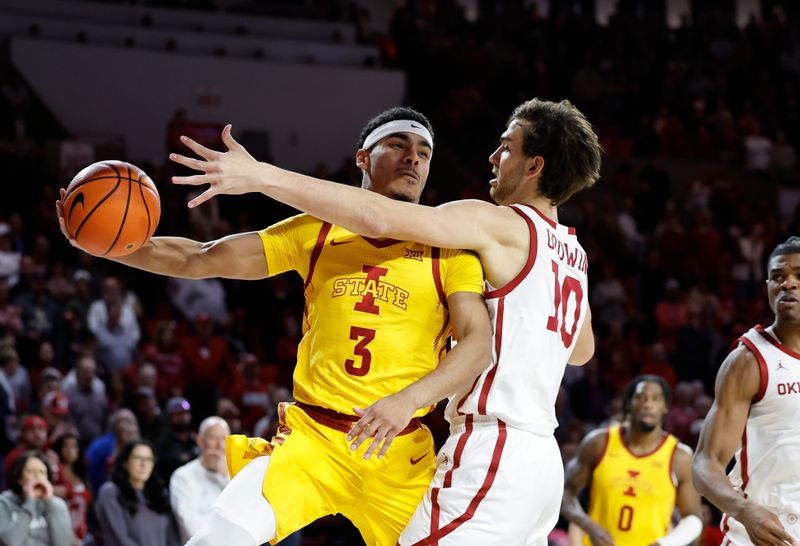 Jan 6, 2024; Norman, Oklahoma, USA; Iowa State Cyclones guard Tamin Lipsey (3) passes the ball around Oklahoma Sooners forward Sam Godwin (10) during the first half at Lloyd Noble Center. Mandatory Credit: Alonzo Adams-USA TODAY Sports