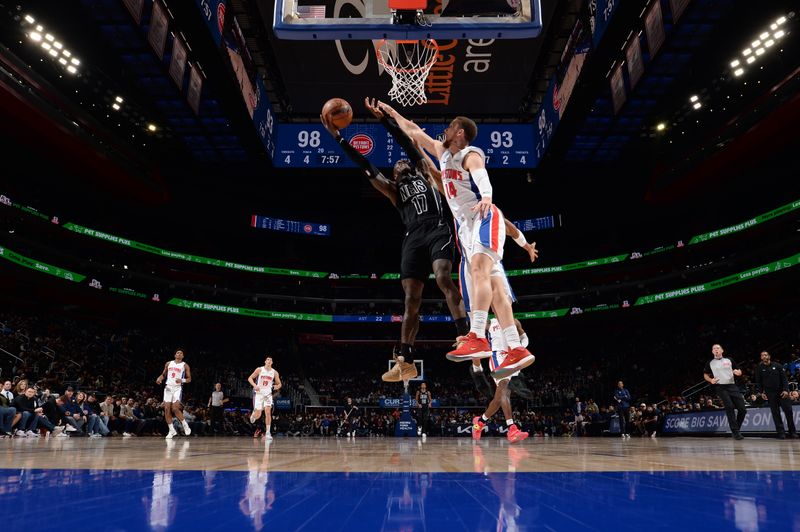 DETROIT, MI - MARCH 7: Dennis Schroder #17 of the Brooklyn Nets shoots the ball during the game against the Detroit Pistons on March 7, 2024 at Little Caesars Arena in Detroit, Michigan. NOTE TO USER: User expressly acknowledges and agrees that, by downloading and/or using this photograph, User is consenting to the terms and conditions of the Getty Images License Agreement. Mandatory Copyright Notice: Copyright 2024 NBAE (Photo by Chris Schwegler/NBAE via Getty Images)