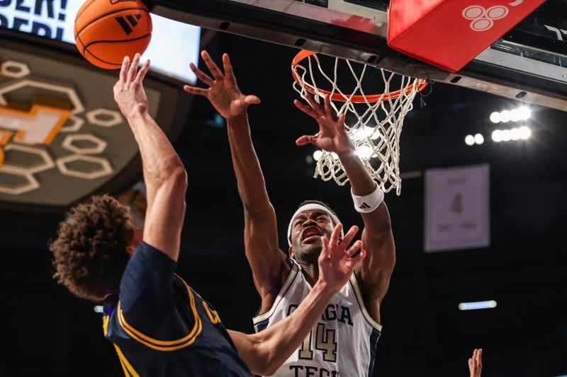 Mar 4, 2026; Atlanta, Georgia, USA; California Golden Bears guard Justin Pippen (10) attempts a shot against Georgia Tech Yellow Jackets forward Kowacie Reeves Jr. (14) during the first half at McCamish Pavilion. Mandatory Credit: Jordan Godfree-Imagn Images