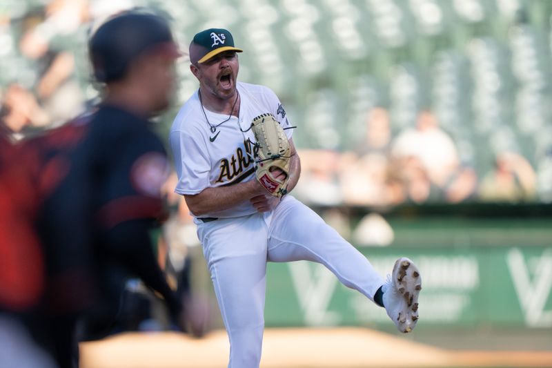 Jul 5, 2024; Oakland, California, USA;  Oakland Athletics pitcher Hogan Harris (63) reacts after giving up a run during the second inning against the Baltimore Orioles at Oakland-Alameda County Coliseum. Mandatory Credit: Stan Szeto-USA TODAY Sports