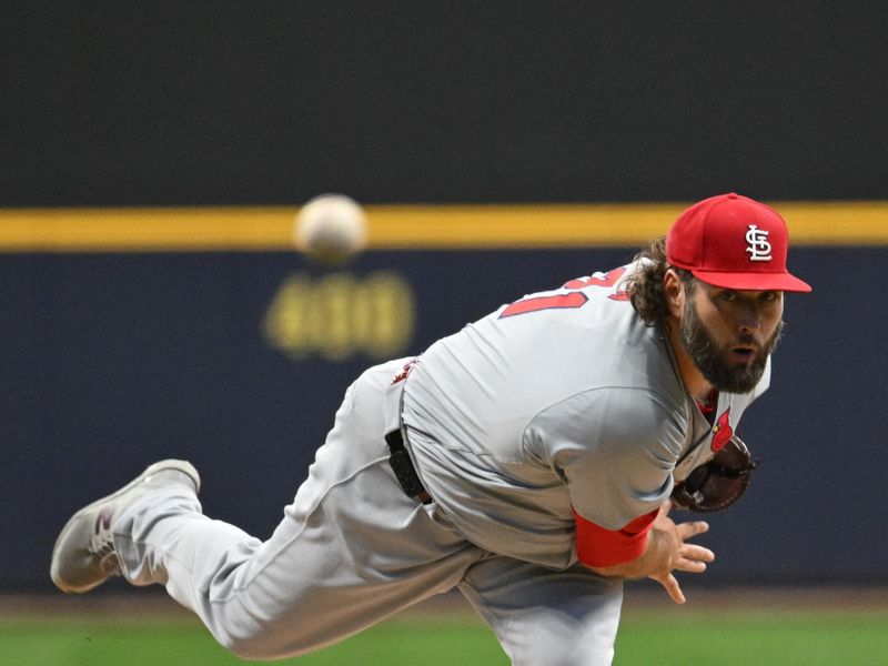 May 10, 2024; Milwaukee, Wisconsin, USA; St. Louis Cardinals pitcher Lance Lynn (31) delivers a pitch against the Milwaukee Brewers in the first inning at American Family Field. Mandatory Credit: Michael McLoone-USA TODAY Sports