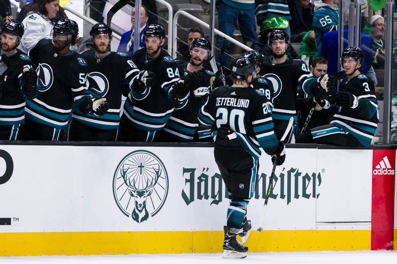 Mar 5, 2024; San Jose, California, USA; San Jose Sharks left wing Fabian Zetterlund (20) celebrates with teammates after scoring against the Dallas Stars during the second period at SAP Center at San Jose. Mandatory Credit: John Hefti-USA TODAY Sports