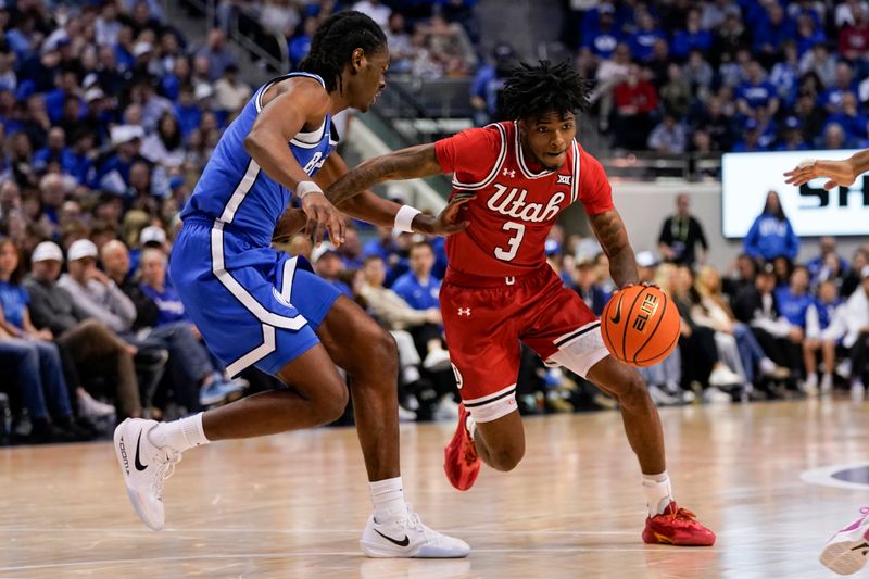 Jan 24, 2026; Provo, Utah, USA; Utah Utes guard Don McHenry (3) controls the ball during the second half against the BYU Cougars at Marriott Center. Mandatory Credit: Aaron Baker-Imagn Images 