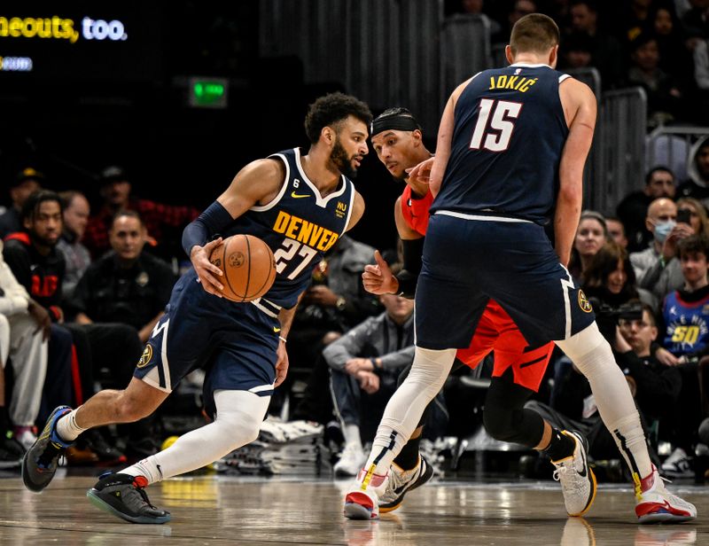 DENVER, CO - JANUARY 17: Jamal Murray (27) of the Denver Nuggets drives around a pick set by Nikola Jokic (15) on Josh Hart (11) of the Portland Trail Blazers during the third quarter at Ball Arena in Denver on Tuesday, January 17, 2023. (Photo by AAron Ontiveroz/MediaNews Group/The Denver Post via Getty Images)