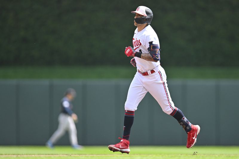 Jun 22, 2023; Minneapolis, Minnesota, USA; Minnesota Twins shortstop Carlos Correa (4) rounds the bases after hitting a home run off Boston Red Sox starting pitcher Justin Garza (63) during the first inning at Target Field. Mandatory Credit: Jeffrey Becker-USA TODAY Sports