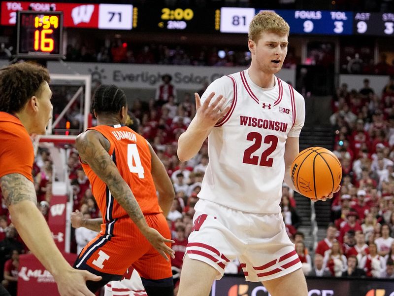 Mar 2, 2024; Madison, WI, USA;  Wisconsin forward Steven Crowl (22) looks for an open teammate during the second half of their game Saturday, March 2, 2024 at the Kohl Center in Madison, Wisconsin.  Mandatory Credit: Mark Hoffman-USA TODAY Sports
