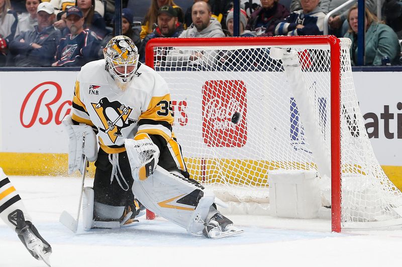 Nov 14, 2023; Columbus, Ohio, USA; Columbus Blue Jackets right wing Kirill Marchenko   s (86) shot (not pictured) beats Pittsburgh Penguins goalie Tristan Jarry (35) for a goal during the first period at Nationwide Arena. Mandatory Credit: Russell LaBounty-USA TODAY Sports