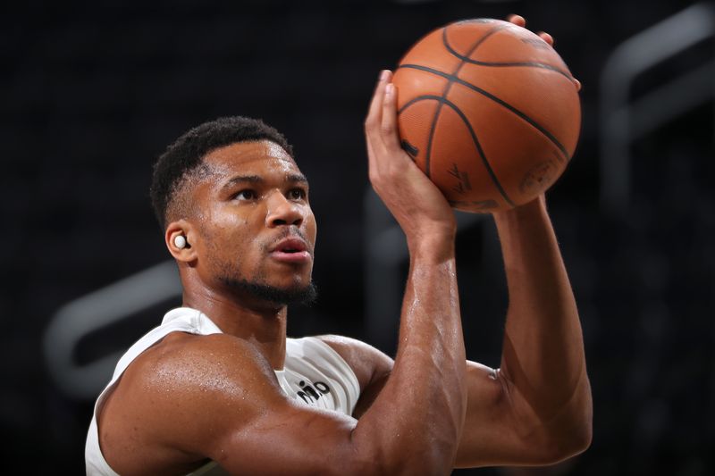 MILWAUKEE, WI - NOVEMBER 10: Giannis Antetokounmpo #34 of the Milwaukee Bucks warms up before the game against the Boston Celtics on November 10, 2024 at the Fiserv Forum Center in Milwaukee, Wisconsin. NOTE TO USER: User expressly acknowledges and agrees that, by downloading and or using this Photograph, user is consenting to the terms and conditions of the Getty Images License Agreement. Mandatory Copyright Notice: Copyright 2024 NBAE (Photo by Gary Dineen/NBAE via Getty Images).