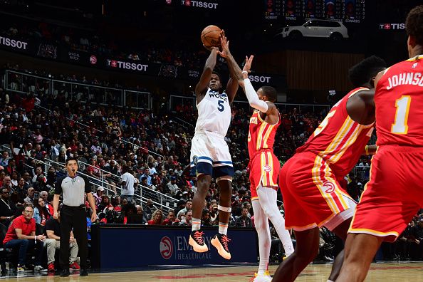 ATLANTA, GA - OCTOBER 30: Anthony Edwards #5 of the Minnesota Timberwolves shoots a three point basket against the Atlanta Hawks on October 30, 2023 at State Farm Arena in Atlanta, Georgia.  NOTE TO USER: User expressly acknowledges and agrees that, by downloading and/or using this Photograph, user is consenting to the terms and conditions of the Getty Images License Agreement. Mandatory Copyright Notice: Copyright 2023 NBAE (Photo by Scott Cunningham/NBAE via Getty Images)