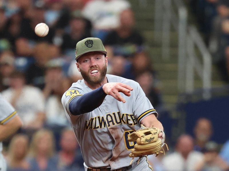 May 20, 2023; St. Petersburg, Florida, USA; Milwaukee Brewers second baseman Owen Miller (6) throws the ball to first base for an out during the third inning against the Tampa Bay Rays at Tropicana Field. Mandatory Credit: Kim Klement-USA TODAY Sports