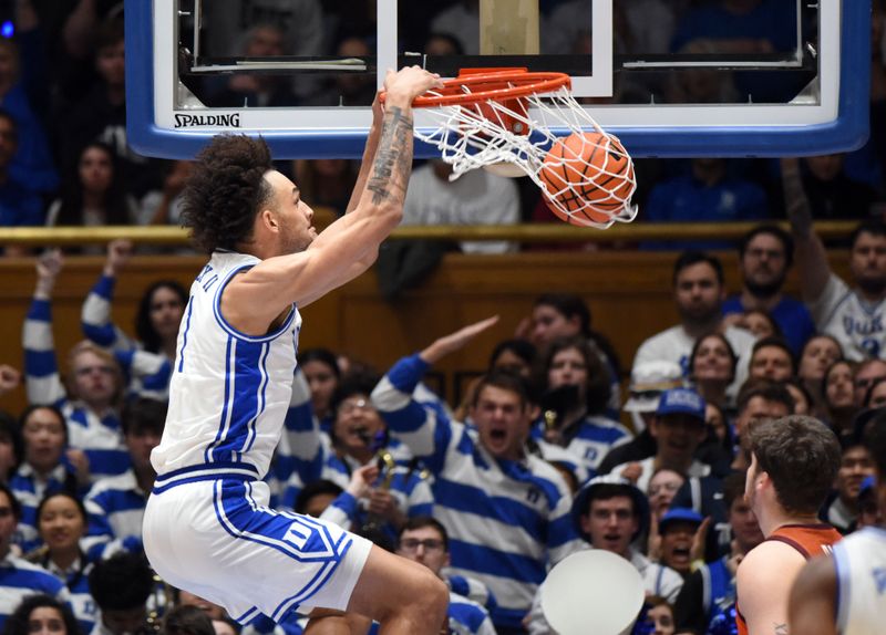 Feb 25, 2023; Durham, North Carolina, USA;  Duke Blue Devils center Dereck Lively (1) dunks during the first half against the Virginia Tech Hokies at Cameron Indoor Stadium. Mandatory Credit: Rob Kinnan-USA TODAY Sports