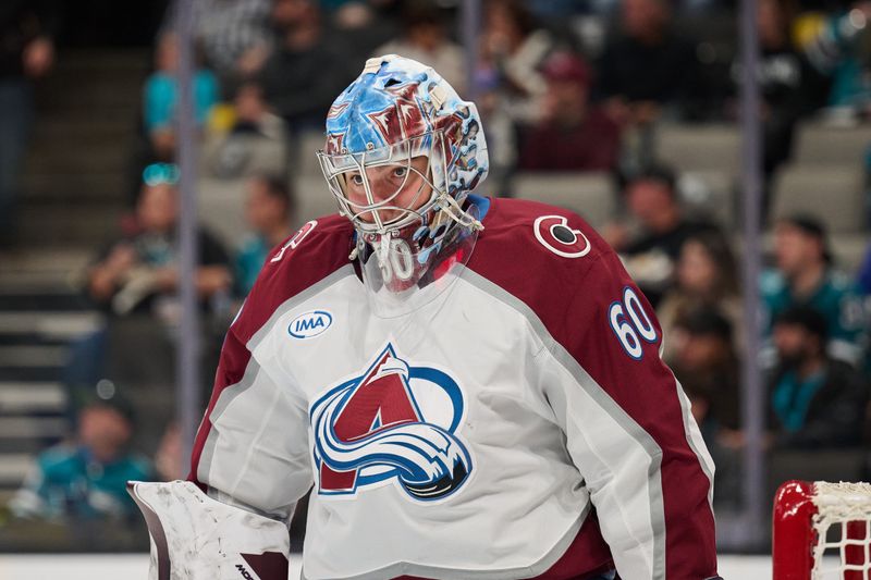 Oct 20, 2024; San Jose, California, USA; Colorado Avalanche goaltender Justus Annunen (60) stands on the ice during a stoppage of play against the San Jose Sharks in the second period at SAP Center at San Jose. Mandatory Credit: Robert Edwards-Imagn Images