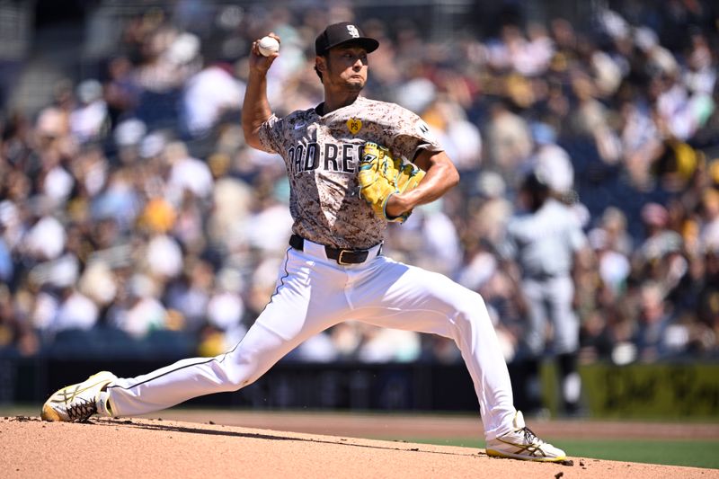 Sep 22, 2024; San Diego, California, USA; San Diego Padres starting pitcher Yu Darvish (11) pitches against the Chicago White Sox during the first inning at Petco Park. Mandatory Credit: Orlando Ramirez-Imagn Images