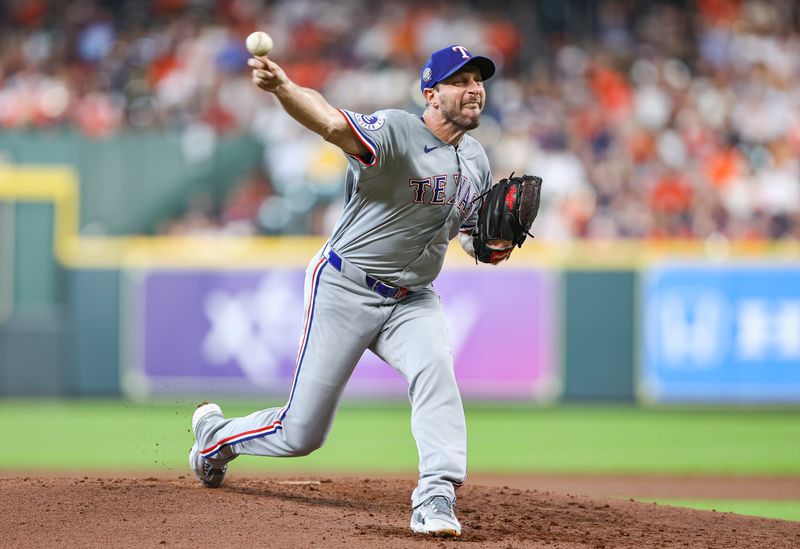 Jul 14, 2024; Houston, Texas, USA; Texas Rangers starting pitcher Max Scherzer (31) delivers a pitch during the second inning against the Houston Astros at Minute Maid Park. Mandatory Credit: Troy Taormina-USA TODAY Sports