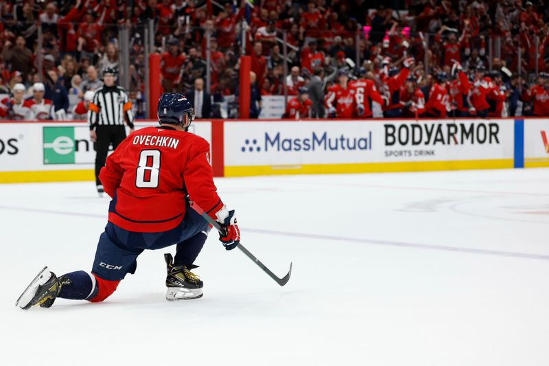 Apr 21, 2025; Washington, District of Columbia, USA; Washington Capitals left wing Alex Ovechkin (8) celebrates after scoring a goal against the Montreal Canadiens in the first period in game one of the first round of the 2025 Stanley Cup Playoffs at Capital One Arena. Mandatory Credit: Geoff Burke-Imagn Images