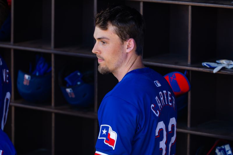 Mar 5, 2024; Peoria, Arizona, USA; Texas Rangers outfielder Evan Carter against the Seattle Mariners during a spring training baseball game at Peoria Sports Complex. Mandatory Credit: Mark J. Rebilas-USA TODAY Sports