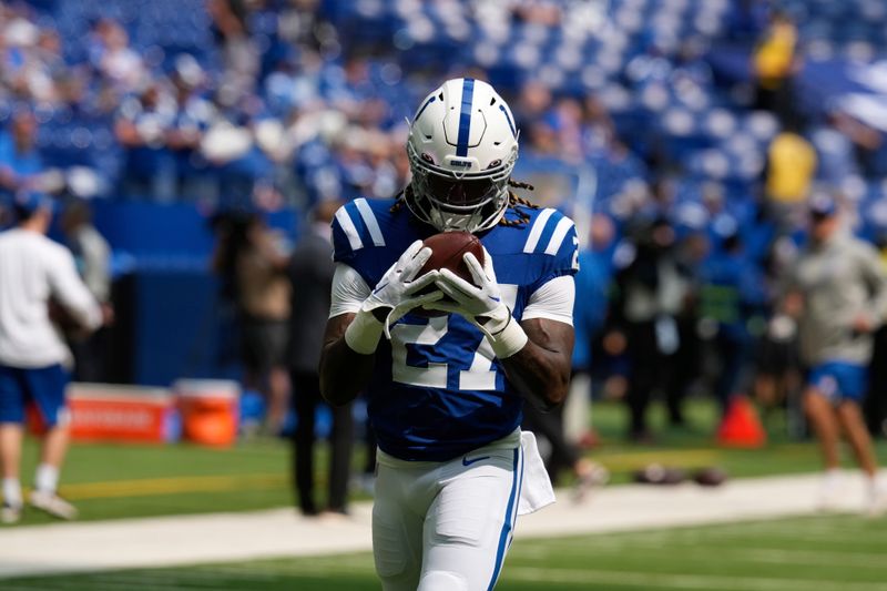 Indianapolis Colts running back Trey Sermon (27) warms up before an NFL football game against the Houston Texans, Sunday, Sept. 8, 2024, in Indianapolis. (AP Photo/Darron Cummings)
