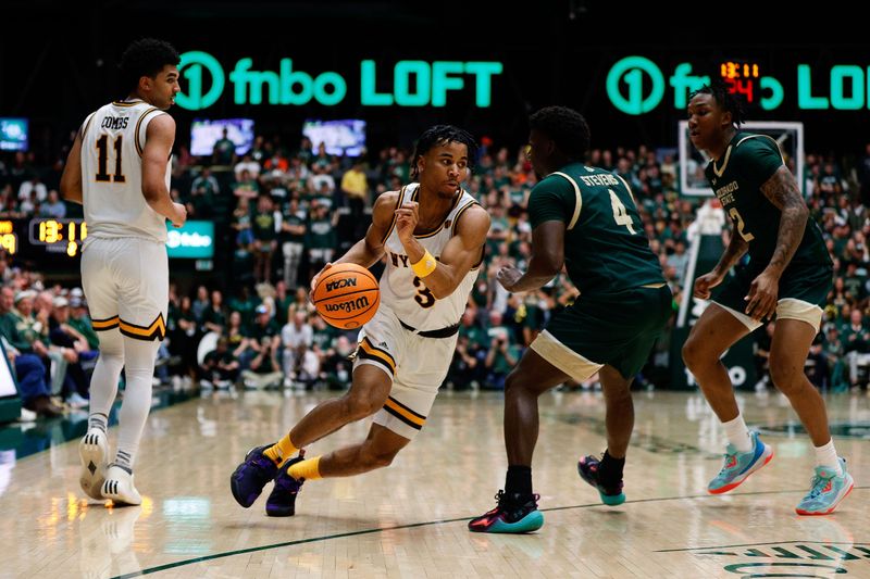 Mar 2, 2024; Fort Collins, Colorado, USA; Wyoming Cowboys guard Sam Griffin (3) drives to the basket against Colorado State Rams guard Isaiah Stevens (4) in the second half at Moby Arena. Mandatory Credit: Isaiah J. Downing-USA TODAY Sports