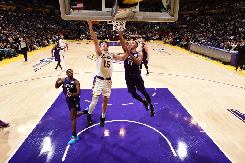 LOS ANGELES, CA - OCTOBER 26: Austin Reaves #15 of the Los Angeles Lakers drives to the basket during the game against the Sacramento Kings on October 26, 2024 at Crypto.Com Arena in Los Angeles, California. NOTE TO USER: User expressly acknowledges and agrees that, by downloading and/or using this Photograph, user is consenting to the terms and conditions of the Getty Images License Agreement. Mandatory Copyright Notice: Copyright 2024 NBAE (Photo by Adam Pantozzi/NBAE via Getty Images)