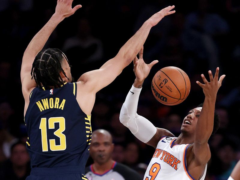 NEW YORK, NEW YORK - APRIL 09:  Jordan Nwora #13 of the Indiana Pacers defends as RJ Barrett #9 of the New York Knicks tries to take a shot in the first half at Madison Square Garden on April 09, 2023 in New York City. NOTE TO USER: User expressly acknowledges and agrees that, by downloading and or using this photograph, User is consenting to the terms and conditions of the Getty Images License Agreement. (Photo by Elsa/Getty Images)