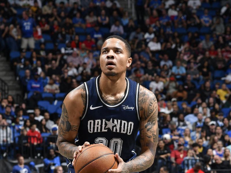 ORLANDO, FL - FEBRUARY 10: Markelle Fultz #20 of the Orlando Magic shoots a free throw during the game against the Chicago Bulls  on February 10, 2024 at the Kia Center in Orlando, Florida. NOTE TO USER: User expressly acknowledges and agrees that, by downloading and or using this photograph, User is consenting to the terms and conditions of the Getty Images License Agreement. Mandatory Copyright Notice: Copyright 2024 NBAE (Photo by Fernando Medina/NBAE via Getty Images)