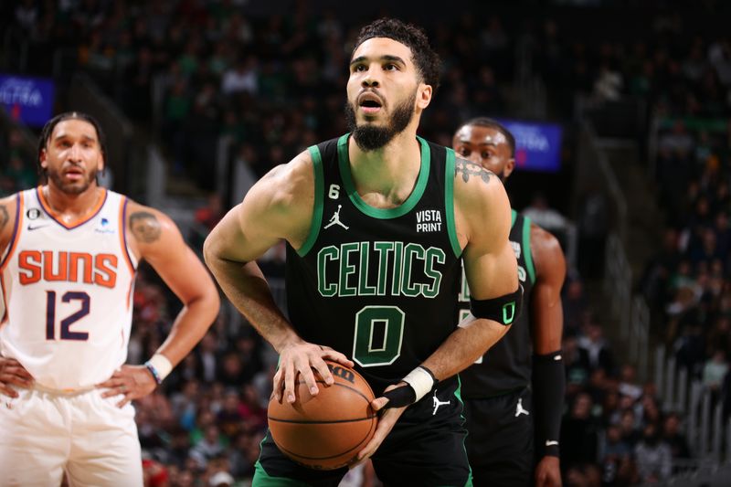 BOSTON, MA - FEBRUARY 3: Jayson Tatum #0 of the Boston Celtics shoots the ball during the game against the Phoenix Suns on February 3, 2023 at TD Garden in Boston, Massachusetts.  NOTE TO USER: User expressly acknowledges and agrees that, by downloading and or using this photograph, User is consenting to the terms and conditions of the Getty Images License Agreement. Mandatory Copyright Notice: Copyright 2022 NBAE  (Photo by Nathaniel S. Butler/NBAE via Getty Images)