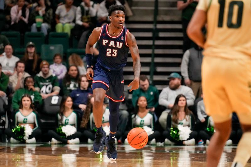 Jan 6, 2024; Charlotte, North Carolina, USA; Florida Atlantic Owls guard Brandon Weatherspoon (23) brings the ball up court during the second half against the Charlotte 49ers at Dale F. Halton Arena. Mandatory Credit: Jim Dedmon-USA TODAY Sports