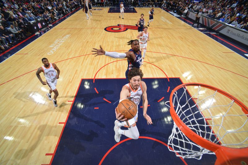 PHILADELPHIA, PA - JANUARY 22: Cedi Osman #16 of the San Antonio Spurs drives to the basket during the game against the Philadelphia 76ers on January 22, 2024 at the Wells Fargo Center in Philadelphia, Pennsylvania NOTE TO USER: User expressly acknowledges and agrees that, by downloading and/or using this Photograph, user is consenting to the terms and conditions of the Getty Images License Agreement. Mandatory Copyright Notice: Copyright 2024 NBAE (Photo by Jesse D. Garrabrant/NBAE via Getty Images)