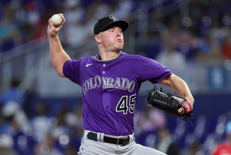 Jul 22, 2023; Miami, Florida, USA; Colorado Rockies starting pitcher Chase Anderson (45) pitches against the Miami Marlins during the first inning at loanDepot Park. Mandatory Credit: Sam Navarro-USA TODAY Sports