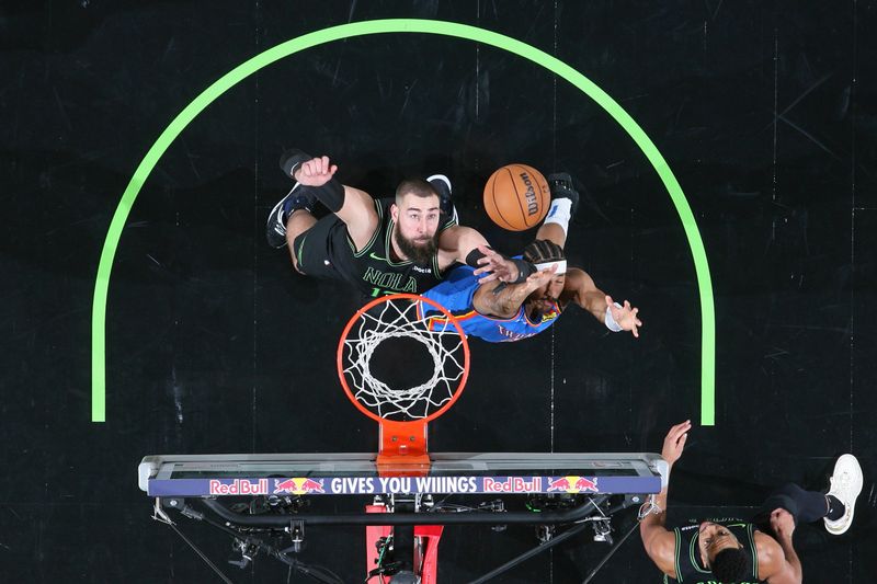 NEW ORLEANS, LA - JANUARY 26: Jonas Valanciunas #17 of the New Orleans Pelicans rebounds during the game against the Oklahoma City Thunder on January 26, 2024 at the Smoothie King Center in New Orleans, Louisiana. NOTE TO USER: User expressly acknowledges and agrees that, by downloading and or using this Photograph, user is consenting to the terms and conditions of the Getty Images License Agreement. Mandatory Copyright Notice: Copyright 2024 NBAE (Photo by Layne Murdoch Jr./NBAE via Getty Images)