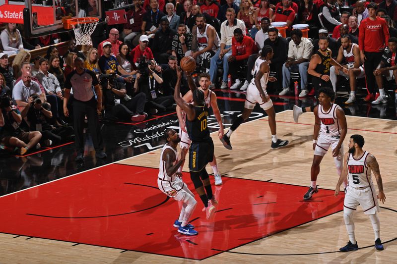 HOUSTON, TX - MAY 4: Jimmy Butler #10 of the Golden State Warriors shoots the ball during the game against the Houston Rockets during Round 1 Game 7 of the 2025 NBA Playoffs on February 1, 2025 at the Toyota Center in Houston, Texas. NOTE TO USER: User expressly acknowledges and agrees that, by downloading and or using this photograph, User is consenting to the terms and conditions of the Getty Images License Agreement. Mandatory Copyright Notice: Copyright 2025 NBAE (Photo by Noah Graham/NBAE via Getty Images)